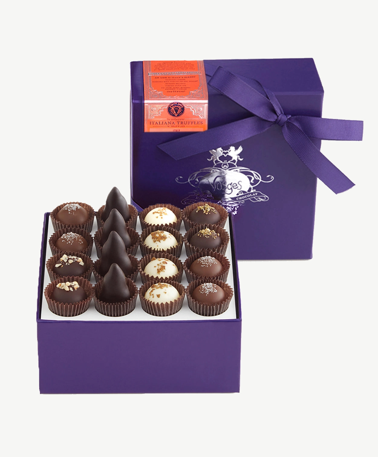 Purple chocolate box embossed with silver foil sits upright displaying four rows of Vosges Italian Truffles on a grey background.