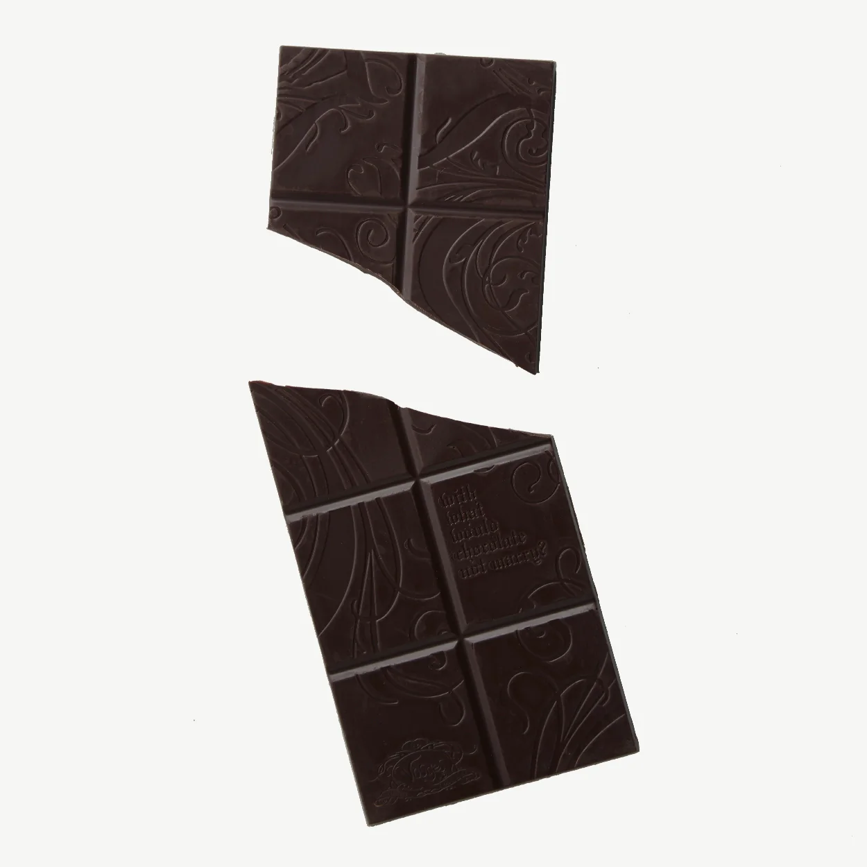 A 3 ounce Vosges chocolate bar broken in half.