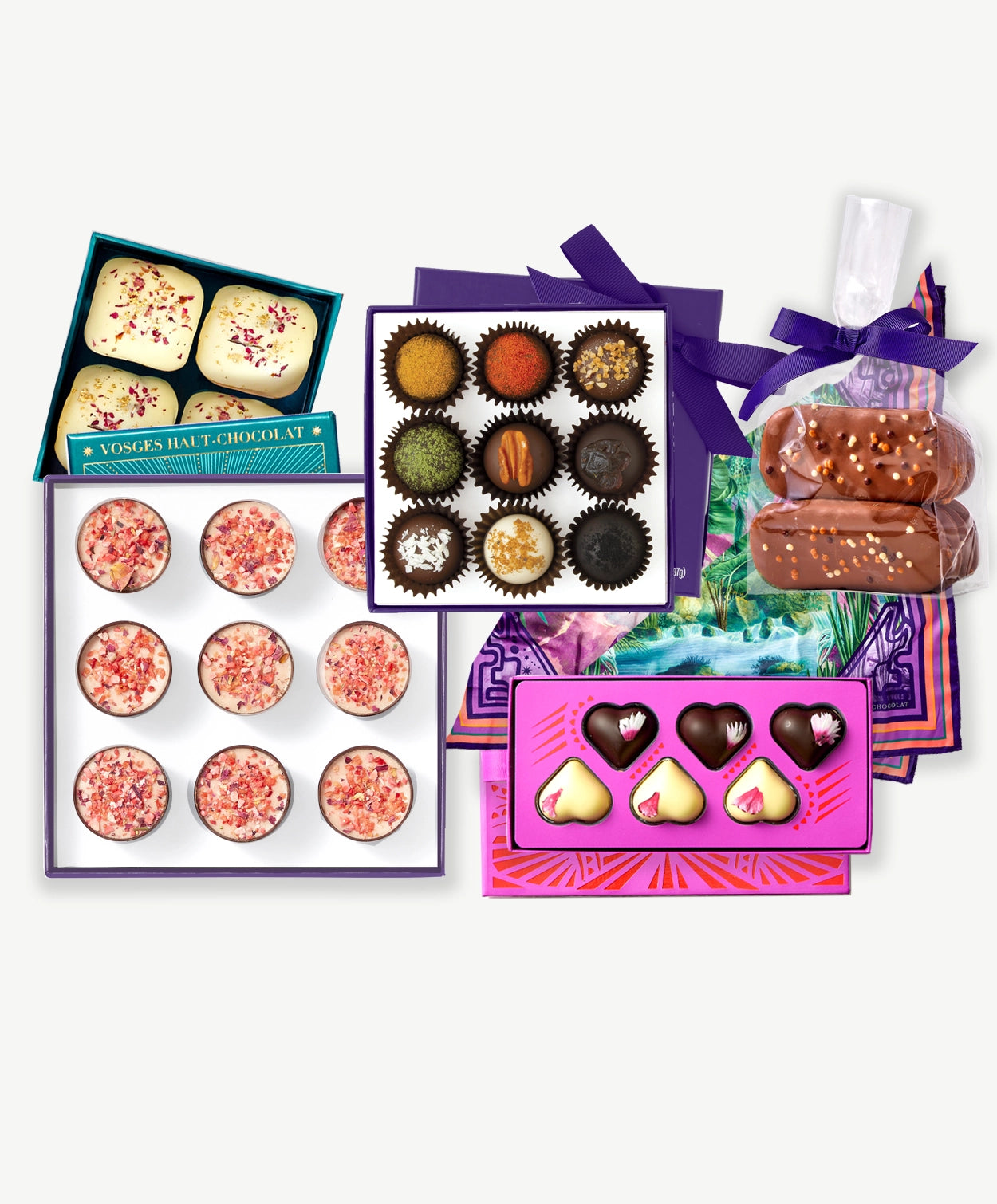 Vosges Mother's Day Spoil your Mama bundle containing several truffle collections in brightly decorated boxes topped with fresh ingredients.
