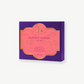 Purple Vosges chocolate box with a pink label reading, "Bapchi's Toffee" stands upright on a white background.