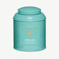 Close-up view of a can of Palais Des Thes Tea on a light grey background.