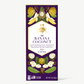Vosges Banana Coconut bar in a purple box decorated with illustrations of fruit on a white background.