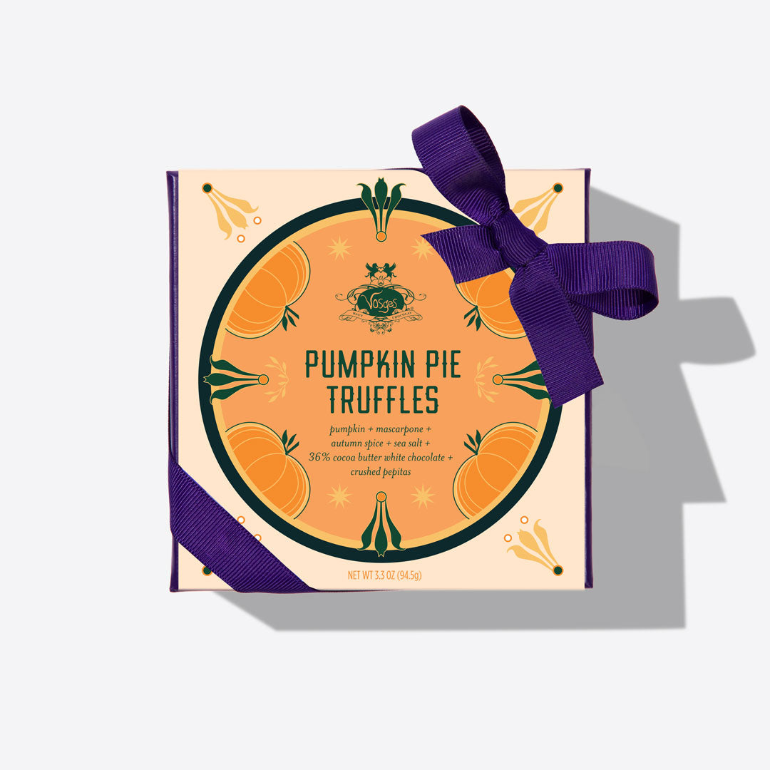 Overhead view of Pumpkin Pie Truffles box wrapped with a purple ribbon