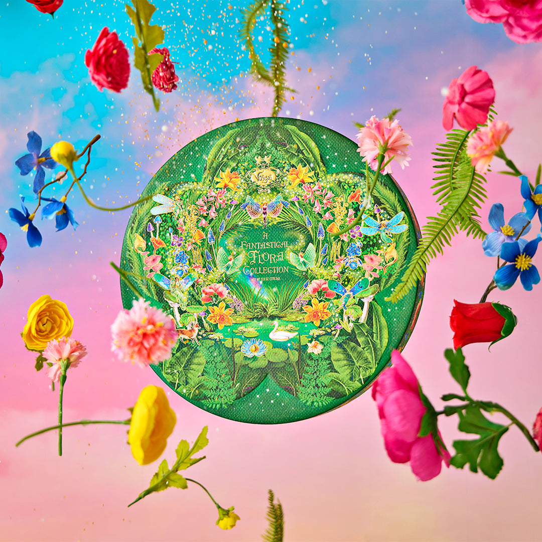 A Vosges Fantastical Flora Collection surrounded by various flowers.