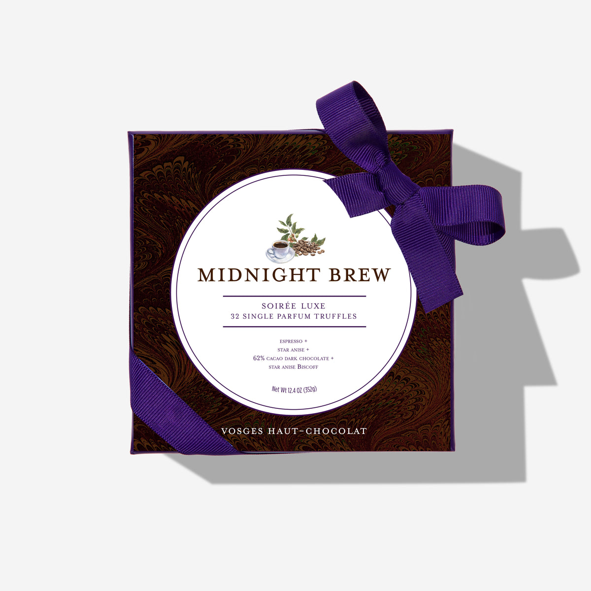 Midnight Brew truffles gift box with a purple ribbon