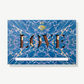 Large two pound slab of Vosges Choclate wrapped in a bright blue psychedelic wrapper reading, "Love" 