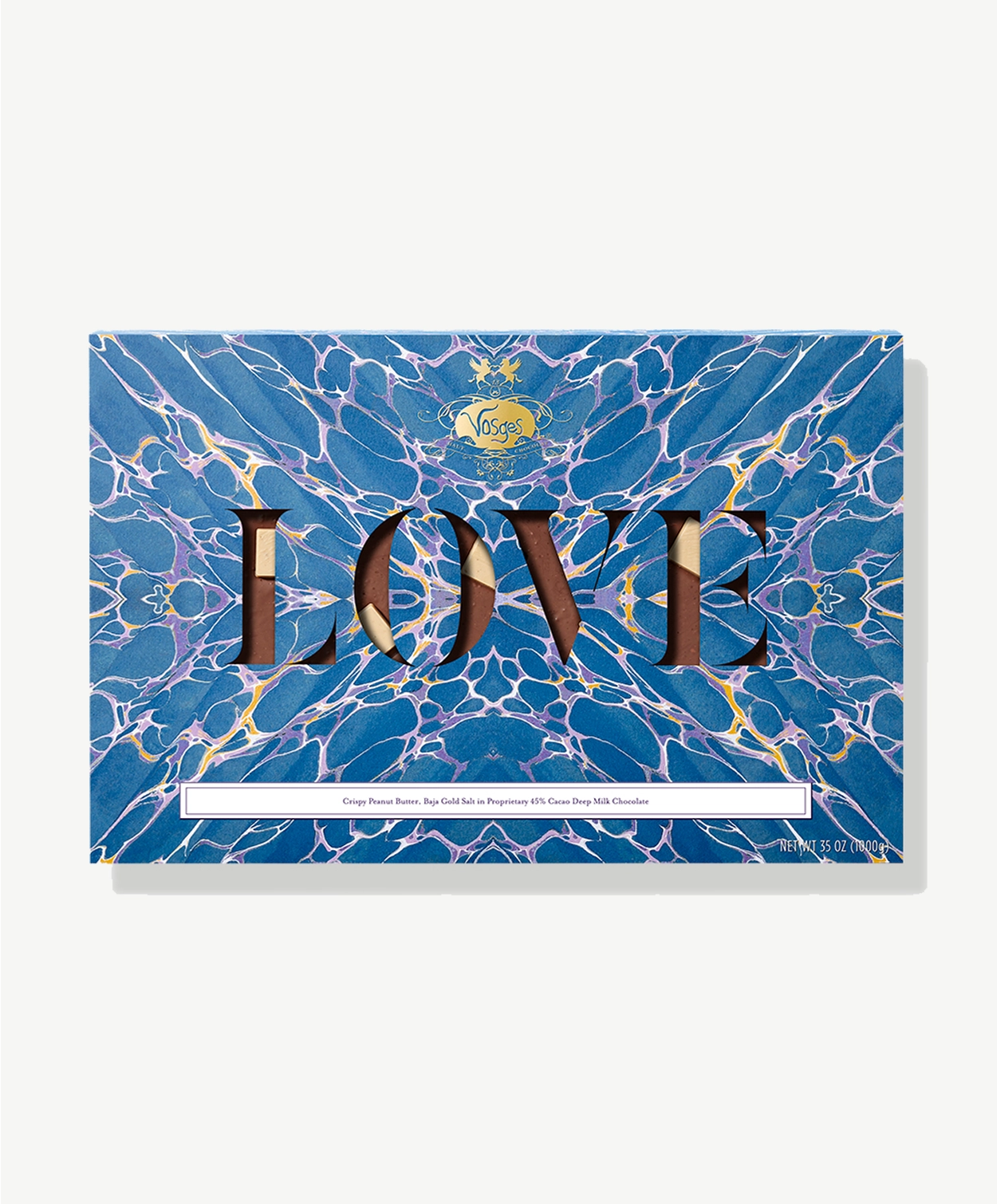 Large two pound slab of Vosges Choclate wrapped in a bright blue psychedelic wrapper reading, "Love" 