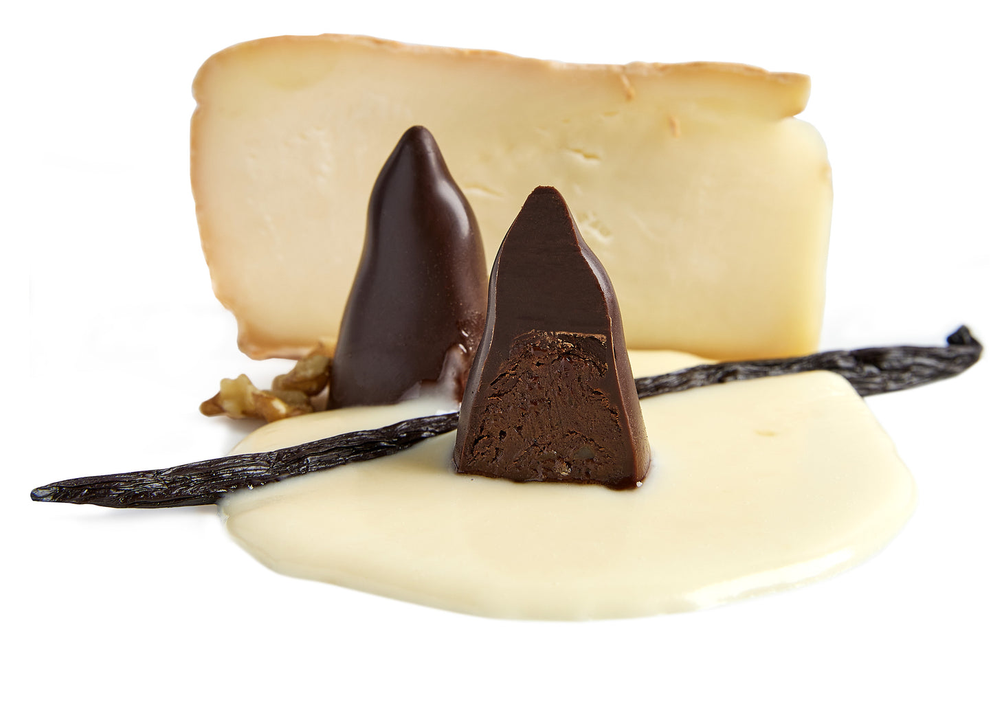 Close up of a white chocolate piece with dark chocolate shards from The Iconic Collection 16 pieces.