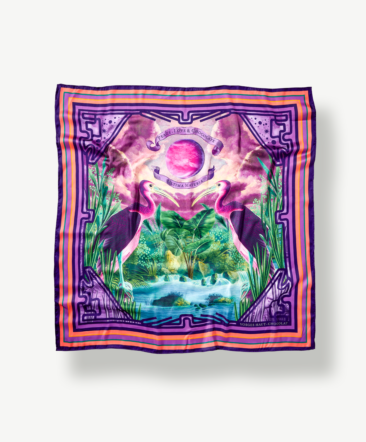 Vibrantly colored pink and purple scarf decorated with images of plants and birds and sky reading, "Peace, Love & Chocolat."