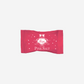 Vosges Pink Salt chocolate bar in pink packaging with white decorative stars