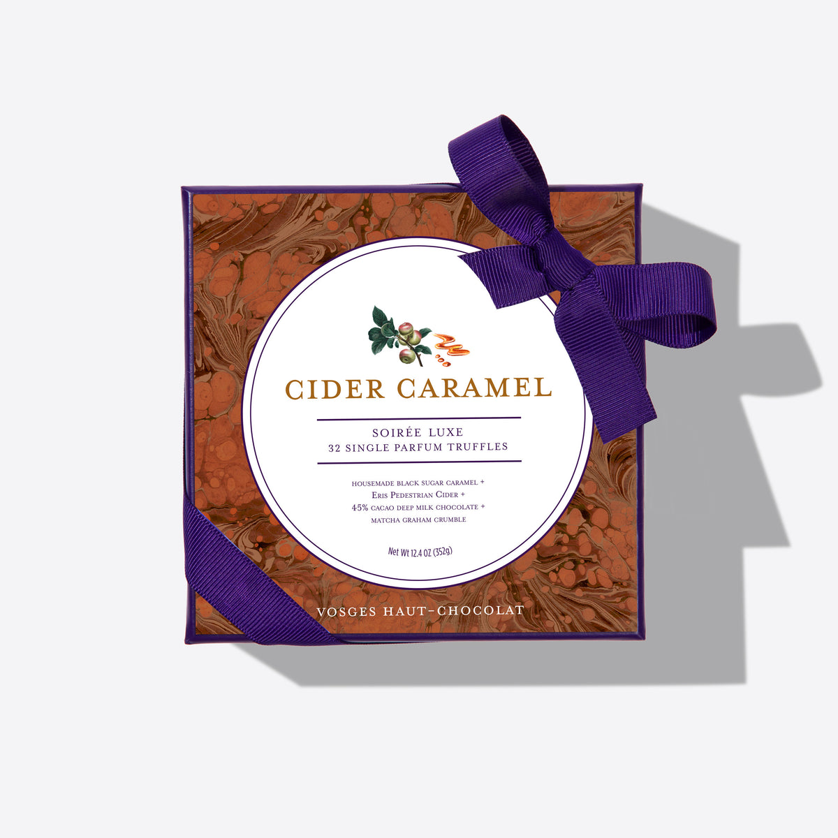 Cider Caramel Truffles box in purple marbled packaging tied with a purple ribbon