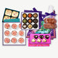 Vosges Mother's Day Spoil your Mama bundle containing several truffle collections in brightly decorated boxes topped with fresh ingredients.  