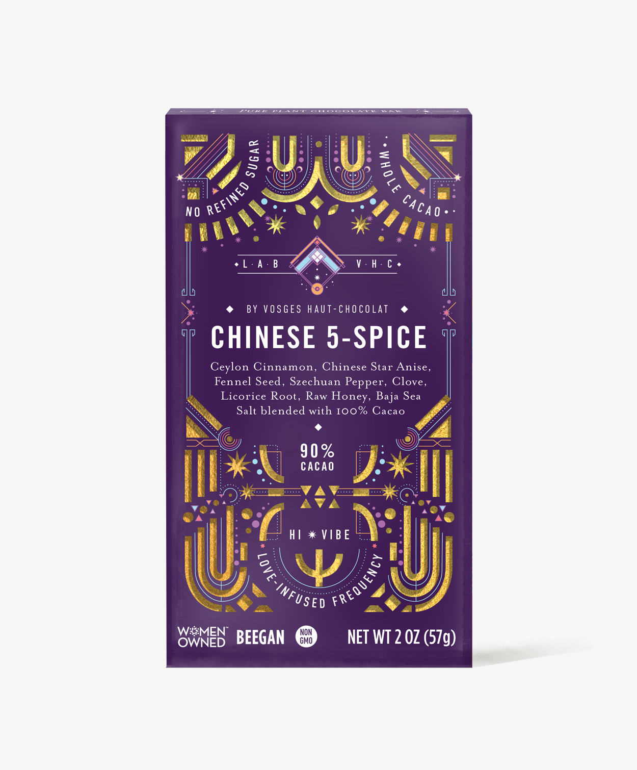 Vosges Chinese 5 spice Pure Plant chocolate bar stands upright in a dark purple box  decorated with golden suns and moons on a grey background. 