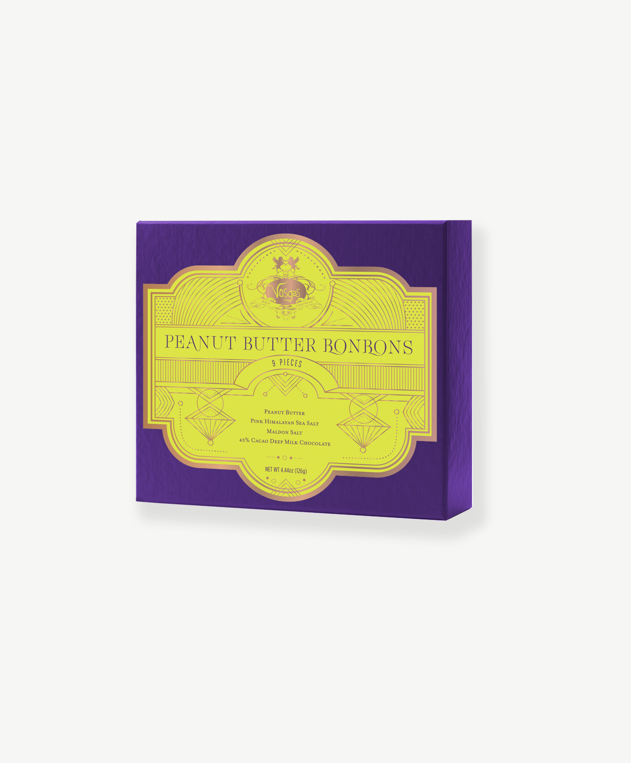A purple Vosges chocolate box with a bright green label reading. "Peanut Butter Bonbons" stands upright on a white background.