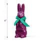 An eight inch tall, purple chocolate rabbit wearing a turquoise and gold ribbon bow stands upright on a white background beside product dimensions.